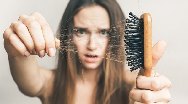 woman with a hairbrush