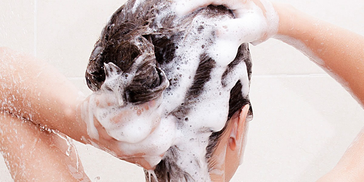 washing hair with shampoo